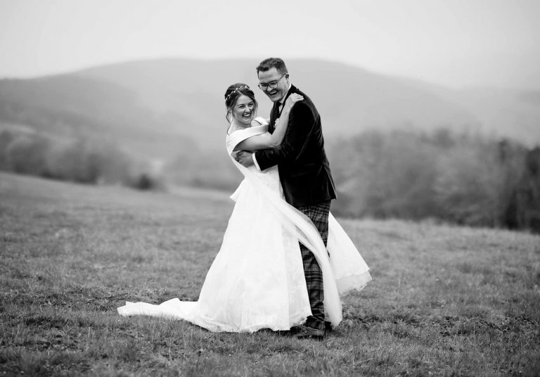 Black and White Wedding Couple with hills behind